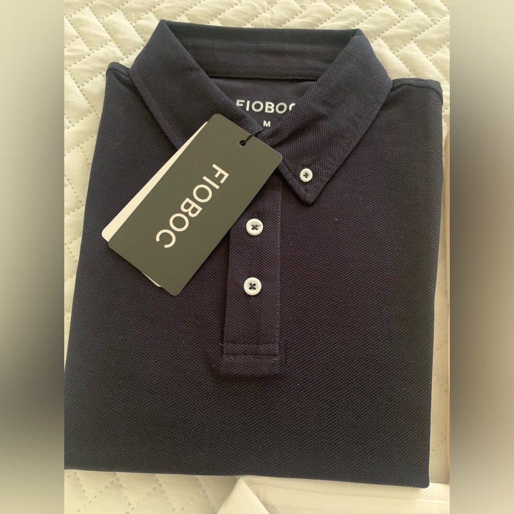 Brand new black men’s polo short sleeve shirts, pit to pit 21 inches.